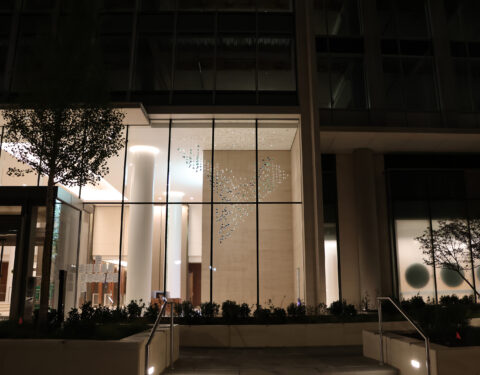 Night time view of the suspended sculpture from the street outside Night time view of the suspended sculpture from the street outside